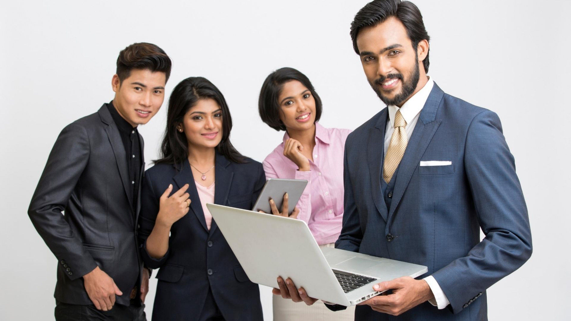 A group of 2 women and 2 men having a discussion